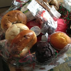 All In A Basket - The basket with muffins, candy, bagels, cream cheese, coffee, and crackers.