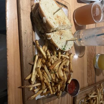 Barrier Island Brewing - Chicken Caprese sandwich with fries and blueberry wheat beer - New American Near Me - St Simons Island, Georgia Barrier Island Brewing - Chicken Caprese sandwich with fries and blueberry wheat beer - New American Near Me - St Simons Island, Georgia