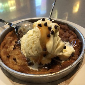 BJ's Restaurant & Brewhouse - BJ's Brewhouse- Who doesn't like warm, gooey, crunchy sweetness with ice cream and Carmel? Anybody? Hello?? Last bite=Fighting spoons! - Pizza Near Me - Cedar Park, Texas BJ's Restaurant & Brewhouse - BJ's Brewhouse- Who doesn't like warm, gooey, crunchy sweetness with ice cream and Carmel? Anybody? Hello?? Last bite=Fighting spoons! - Pizza Near Me - Cedar Park, Texas