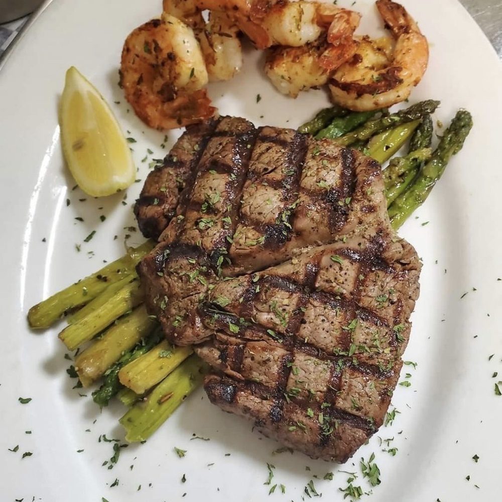 Harris's Steak & Seafood - This is Harris' Steak and Seafood advertised Surf and Turf with a butterflied Filet Mignon. - Steakhouses Near Me - Brunswick, Georgia Harris's Steak & Seafood - This is Harris' Steak and Seafood advertised Surf and Turf with a butterflied Filet Mignon. - Steakhouses Near Me - Brunswick, Georgia