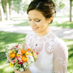 Rachel's Rose Garden - Photo by Madison Wathen. Bridal bouquet of Ranunculus, Anemone, Larkspur, Viking Pompons, Misty Blue Limonium.
www.DesignsByRachelKY.com
