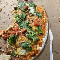 House Of Rock - We had to cut our own pizza. It was like cardboard
