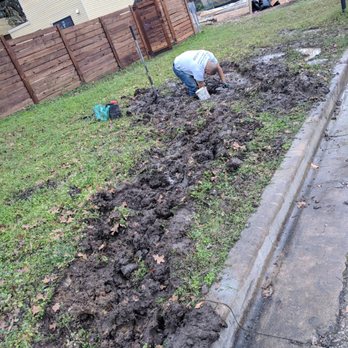 Splash Green Clean - plumber fixing our water main after Splash drove a massive trailer through our yard. Splash was working on a site next door, not for us. - Junk Removal & Hauling Near Me - Austin, Texas