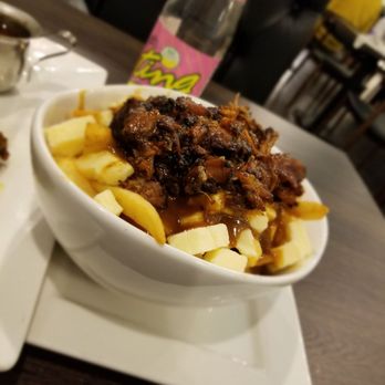 Creole Jamaican Kitchen + Bar - Oxtail poutine - Caribbean Near Me - Woodbridge, Ontario
