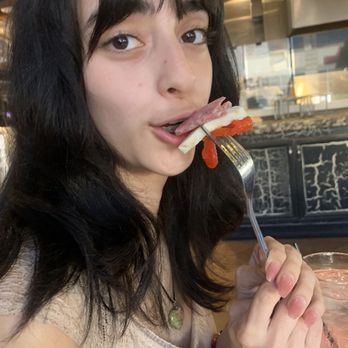 Grimaldi's Pizzeria - soon to be birthday girl eating away on one of the many famous grimaldi's appetizers - Pizza Near Me - Katy, Texas Grimaldi's Pizzeria - soon to be birthday girl eating away on one of the many famous grimaldi's appetizers - Pizza Near Me - Katy, Texas