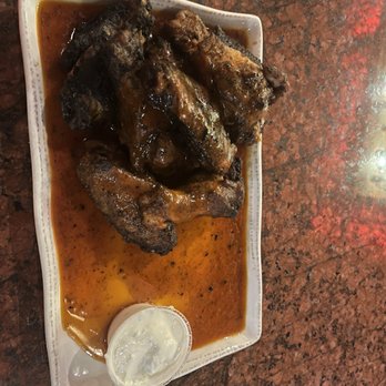 Blaze - Brown butter buffalo wings - Bars Near Me - Bangor, Maine