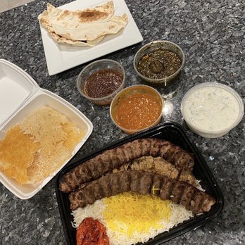 Irvine Grill - Beef soltani with an add beef koobideh, mast o khear, 3 different stews to drizzle on the tahdig. - Mediterranean Near Me - Irvine, California Irvine Grill - Beef soltani with an add beef koobideh, mast o khear, 3 different stews to drizzle on the tahdig. - Mediterranean Near Me - Irvine, California