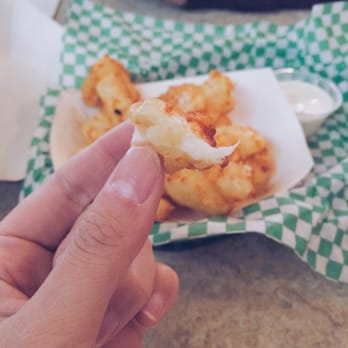 Casper's and Runyon's Nook - Bite of the cheese curd. - Dive Bars Near Me - Saint Paul, Minnesota Casper's and Runyon's Nook - Bite of the cheese curd. - Dive Bars Near Me - Saint Paul, Minnesota