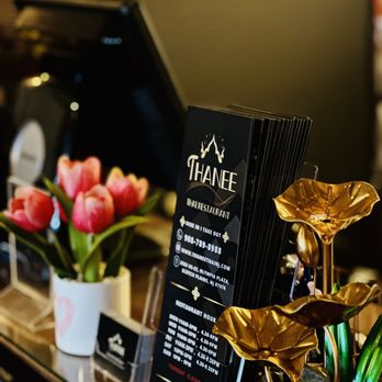 Thanee Thai - the menu and flowers on the counter - Thai Near Me - Scotch Plains, New Jersey Thanee Thai - the menu and flowers on the counter - Thai Near Me - Scotch Plains, New Jersey