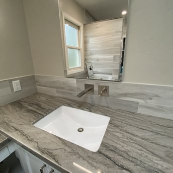 Emanate Design - New sink with lighted medicine cabinet and wall mounted faucet - Interior Design Near Me