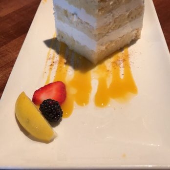Winewood - Triple layer lemon cake...flavorful, delicious and perfect presentation - New American Near Me - Grapevine, Texas