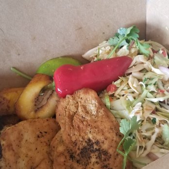 Bodega - coconut chicken with slaw instead of rice and beans. super spicy pepper. delicious - Latin American Near Me - St Petersburg, Florida