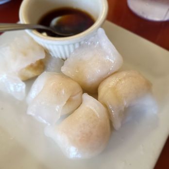 Dumpling House - a plate of dumplings and a bowl of sauce - Szechuan Near Me - Milford, Connecticut Dumpling House - a plate of dumplings and a bowl of sauce - Szechuan Near Me - Milford, Connecticut