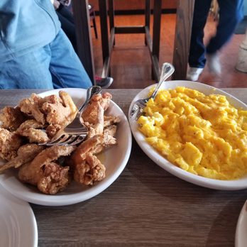Le Petit Dejeuner - Chicken wings cheese grits - Breakfast & Brunch Near Me - Detroit, Michigan Le Petit Dejeuner - Chicken wings cheese grits - Breakfast & Brunch Near Me - Detroit, Michigan