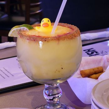 Catfish & Company - Rubber Duck mango margarita. Nice flavor but too many large ice chunks made it hard to drink. - Seafood Near Me - Hurst, Texas
