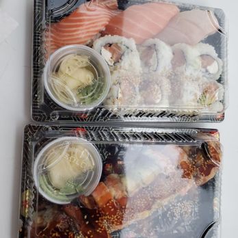 SUSHI KOI - two trays of food on a table - Sushi Bars Near Me - St Louis, Missouri SUSHI KOI - two trays of food on a table - Sushi Bars Near Me - St Louis, Missouri