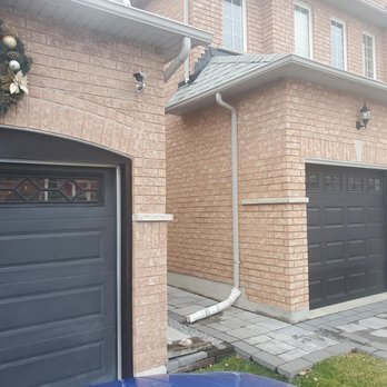 Chi Overhead Doors - comparison of my garage door and the neighbour's garage door installed at the same time. - Garage Door Services Near Me - Arthur, Illinois Chi Overhead Doors - comparison of my garage door and the neighbour's garage door installed at the same time. - Garage Door Services Near Me - Arthur, Illinois