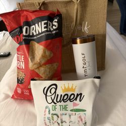 Welcome gift bags. Lots of golf goodies and snacks for our trip. So cute!