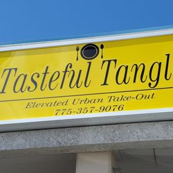Tasteful Tangle - Main sign viewable in the parking lot