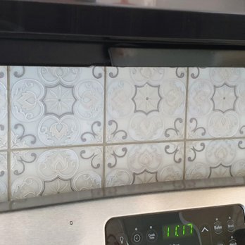 Glenn Construction - We are in love with this new tile behind our stove. - General Contractors Near Me