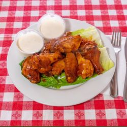 Gio's Pizza - Industrial Drive - Deep fried chicken wings served with choice of your dressing and dipping sauce  on side
