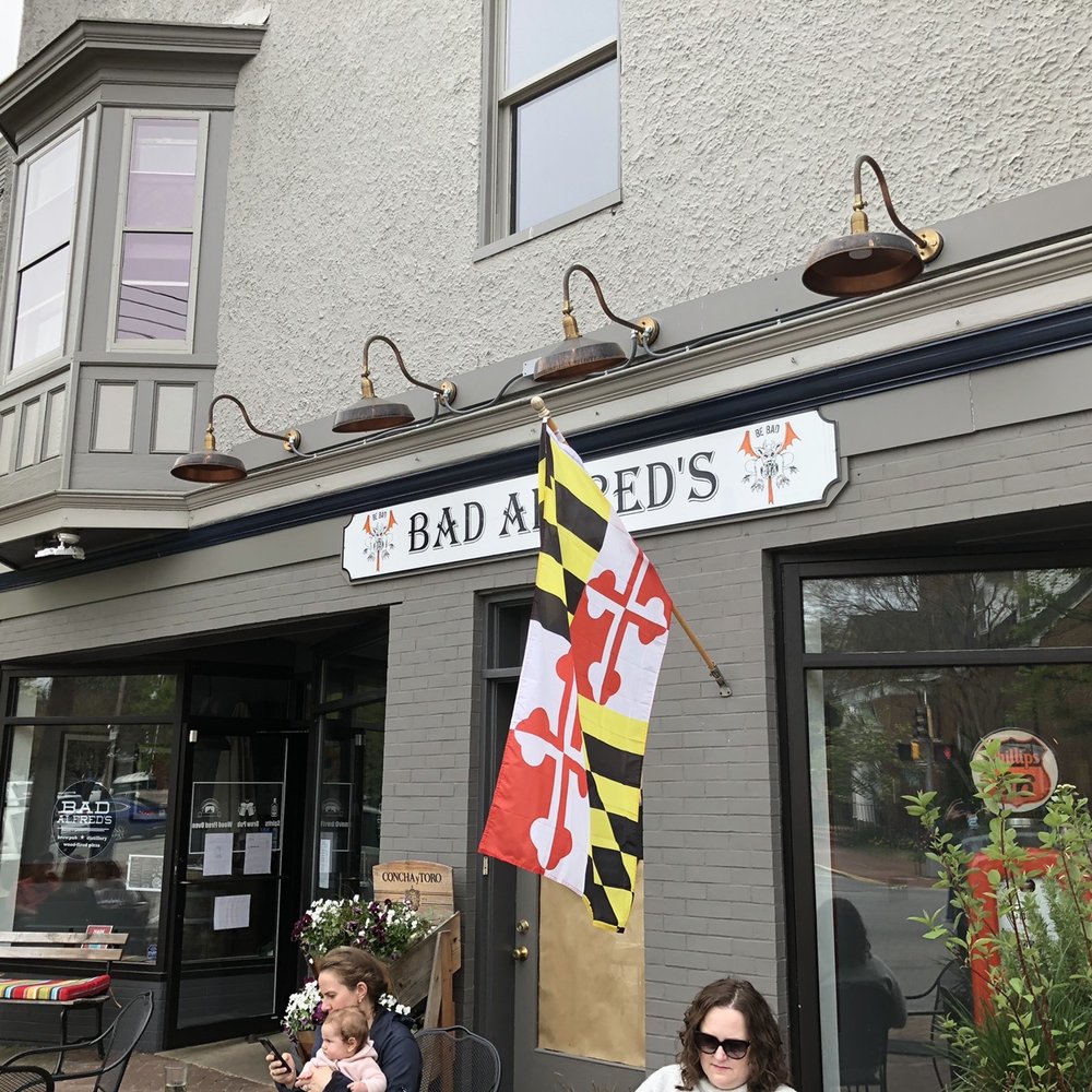 Bad Alfred's Distilling - two women sitting outside a restaurant - Pizza Near Me - Chestertown, Maryland