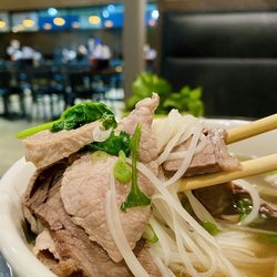 Pho Big Bowl Vietnamese Kitchen - P5. SLICED STEAK & BRISKET PHO Served with bean sprouts, basil, lime & jalapeños.