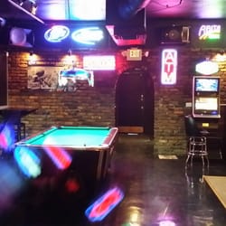 Cheers - Recently remodeled. Clean  affordable prices. 9 tvs, pool table, dart boards and alcohol what else you need
