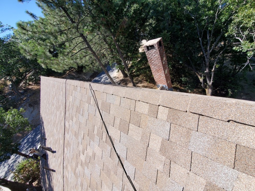 Slide of Arrowhead Roofing