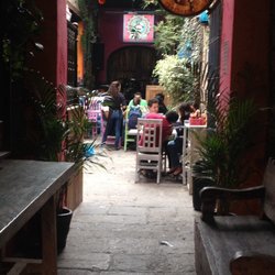 SuFrida - Entrance of SuFrida. It has tables outside and indoors.