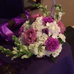 White hydrangea, moonlite carnations, blue curiosa roses and white snapdragon wings. So pretty!!