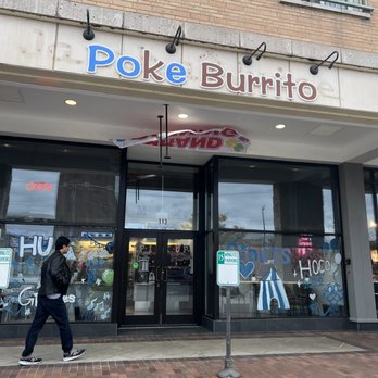 Poke Burrito - a man walking in front of a poke burrito restaurant - Poke Near Me - Highland Park, Illinois Poke Burrito - a man walking in front of a poke burrito restaurant - Poke Near Me - Highland Park, Illinois