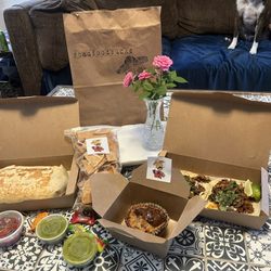 Burrito, tacos, chips, salsa, guac, dulce de leche bread pudding