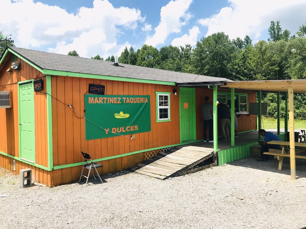 Martinez Taqueria Y Dulces Logo