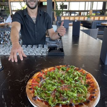 Earls Kitchen + Bar - Prosciutto and arugula pizza! - New American Near Me - Miami, Florida Earls Kitchen + Bar - Prosciutto and arugula pizza! - New American Near Me - Miami, Florida