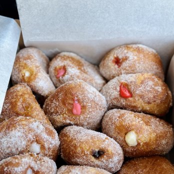 Leonard's Bakery - Dozen Malasadas, 2 of each flavor. (Vanilla, Guava, Huapia, Coconut, Chocolate and the flavor of the month- Strawberry) - Bakeries Near Me - Honolulu, Hawaii Leonard's Bakery - Dozen Malasadas, 2 of each flavor. (Vanilla, Guava, Huapia, Coconut, Chocolate and the flavor of the month- Strawberry) - Bakeries Near Me - Honolulu, Hawaii