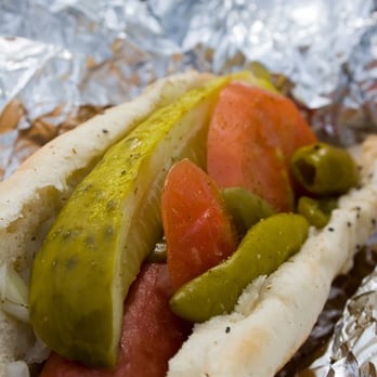 Museum Campus Cafe - a hot dog with pickles and tomatoes - Hot Dogs Near Me - Chicago, Illinois Museum Campus Cafe - a hot dog with pickles and tomatoes - Hot Dogs Near Me - Chicago, Illinois