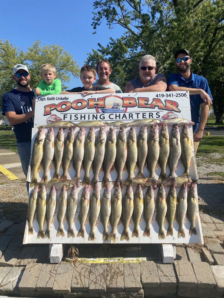Pooh Bear fishing charters Logo