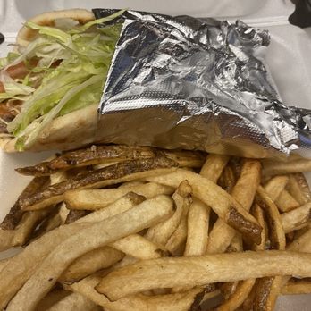 Philly Steak & Wings - a sandwich and french fries - Chicken Wings Near Me - Clermont, Florida