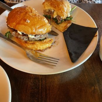 Roosevelt's - Tenderloin Burger: house patty, topped with Creekstone Farms tenderloin, brie, arugula, crispy shallots, red wine aioli, house brioche bun. - Gastropubs Near Me - Tulsa, Oklahoma