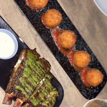 Black Walnut - Smoked Mac and cheese bites and lamb ribs appetizers - New American Near Me - Oklahoma City, Oklahoma Black Walnut - Smoked Mac and cheese bites and lamb ribs appetizers - New American Near Me - Oklahoma City, Oklahoma