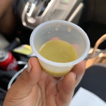 Tacos El Azteca - a hand holding a cup of tacos - Mexican Near Me - Norwalk, Connecticut Tacos El Azteca - a hand holding a cup of tacos - Mexican Near Me - Norwalk, Connecticut