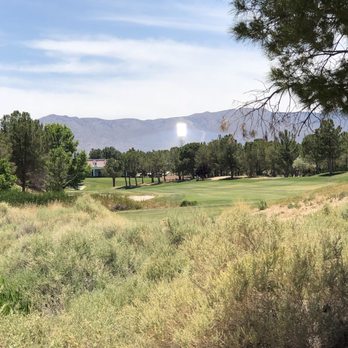 Primm Valley Golf Course - Lakes 15 with the searing solar tower in the distance - Golf Near Me - Nipton, California Primm Valley Golf Course - Lakes 15 with the searing solar tower in the distance - Golf Near Me - Nipton, California