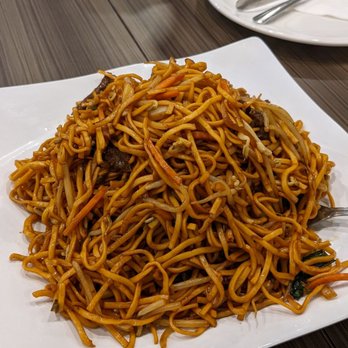 Best Hakka - a pile of noodles on a plate - Hakka Near Me - Toronto, Ontario