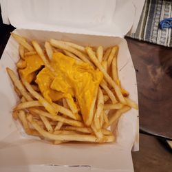 Freddy's Frozen Custard & Steakburgers - Cheese fries lacking the cheese