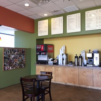 Lone Star Kolaches - Coffee & drink station inside, small tables & chairs, local dog photos - Breakfast & Brunch Near Me - Pflugerville, Texas Lone Star Kolaches - Coffee & drink station inside, small tables & chairs, local dog photos - Breakfast & Brunch Near Me - Pflugerville, Texas