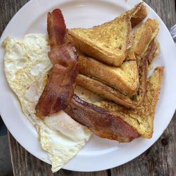 Orange Blossoms - Keystone Heights - French Toast with two eggs over medium and bacon. - Southern Near Me - Keystone Heights, Florida