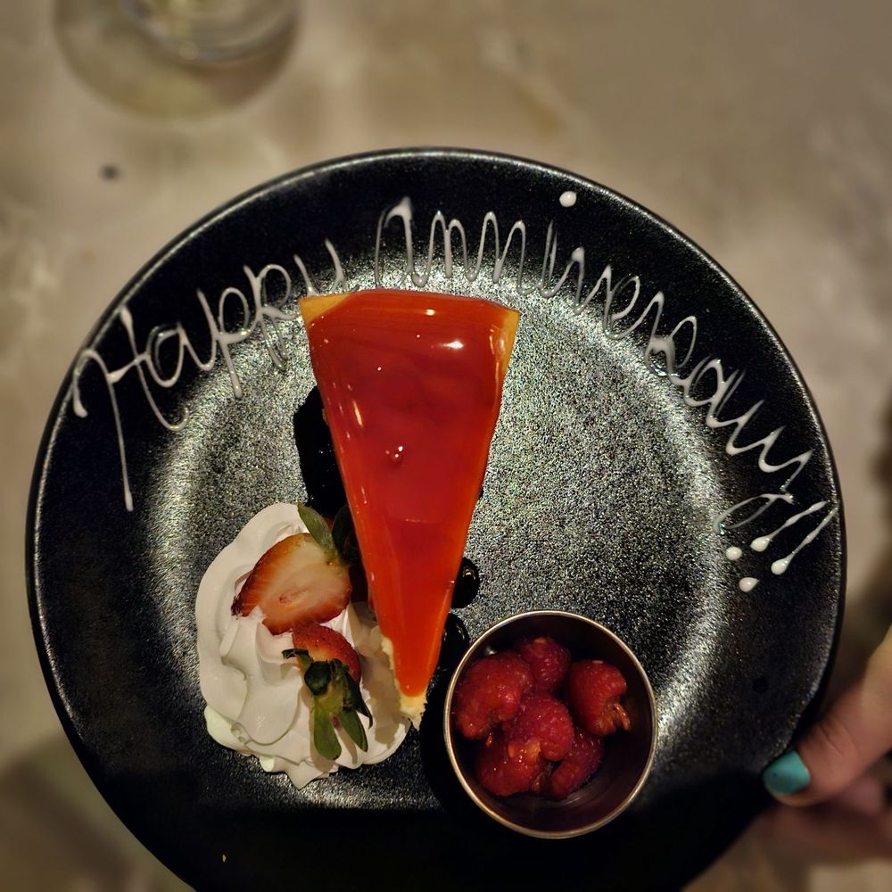 Fogo de Chão - a piece of cheesecake and strawberries - Brazilian Near Me - Oak Brook, Illinois