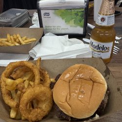 Taylor Belle’s & Burgers - My double burger with pimento cheese and pickles. Plus a half and half order of fries and rings. Topped off with a super cold modelo!