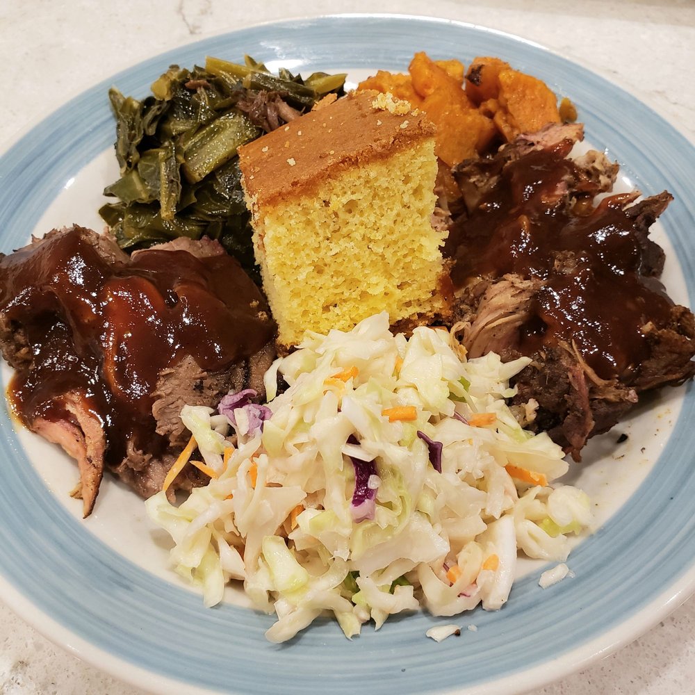 Emma's BBQ - Brisket and pulled pork with yam, collard greens, cornbread, and coleslaw. IG: @take.a.bite.with.me - Southern Near Me - Seattle, Washington Emma's BBQ - Brisket and pulled pork with yam, collard greens, cornbread, and coleslaw. IG: @take.a.bite.with.me - Southern Near Me - Seattle, Washington